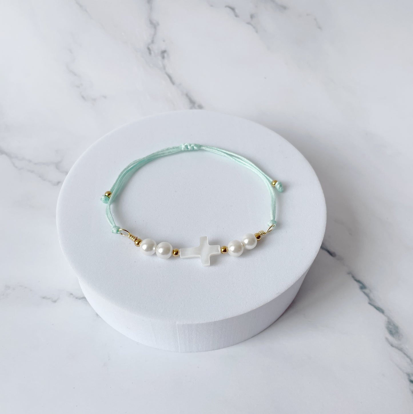 Pulsera Cruz Nácar (pasteles)
