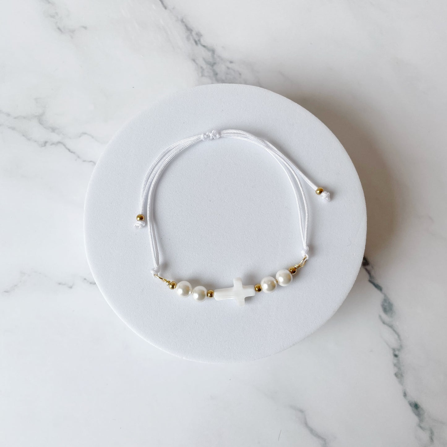 Pulsera Cruz Nácar (neutros)