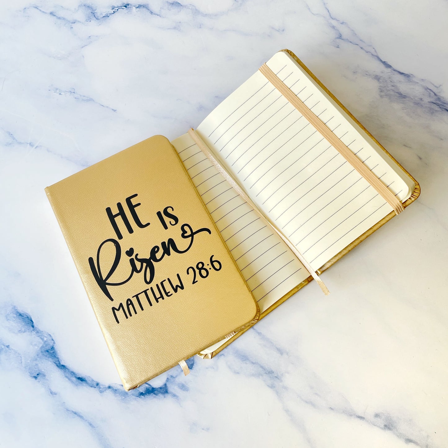 Notebook Biocuero He is Risen dorado