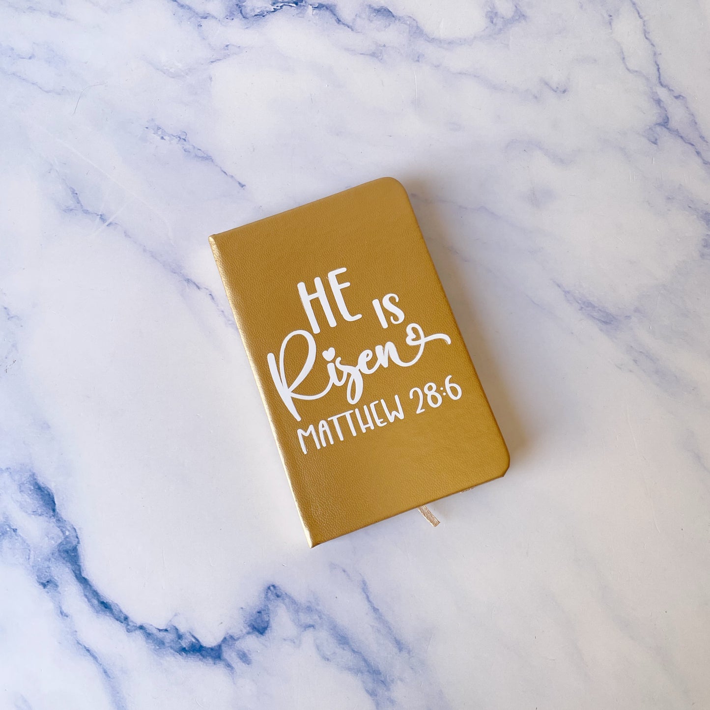 Notebook Biocuero He is Risen dorado