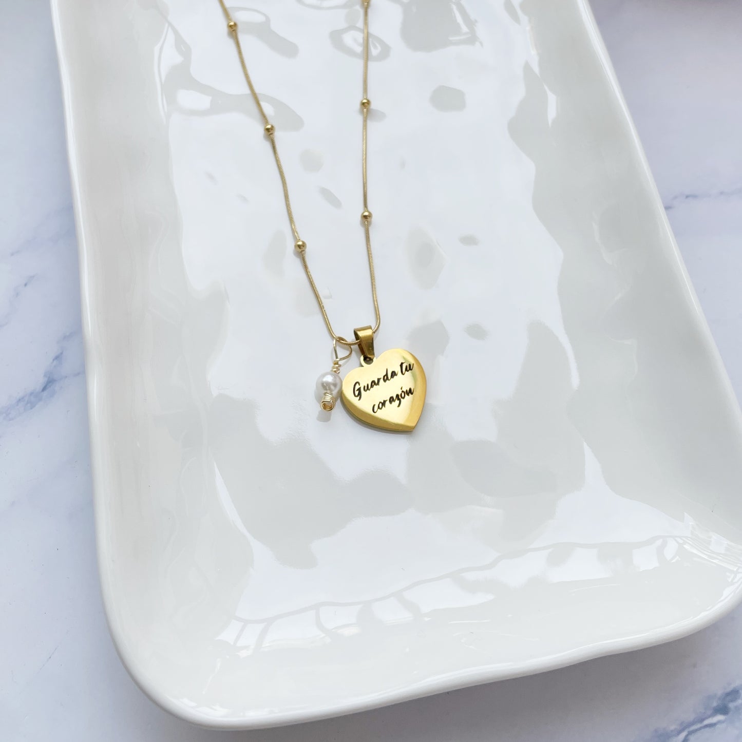 Collar Guarda tu corazón dorado